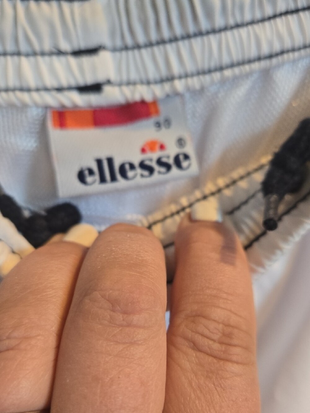 Ellesse White Track Pants with Black Logo Stripes - Picture 2 of 3